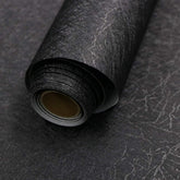 Abyssaly Black Silk Wallpaper embossed texture for a smooth, bubble-free finish.