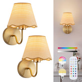ADISUN battery wall sconce with gold finish and rattan shade for cozy ambience.