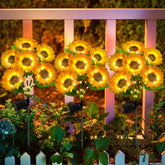 Ahaorigin Solar Sunflower Lights outdoor 3-pack illuminate garden paths with warm glow.