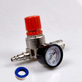 Air regulator with 1/4-inch mini gauge shows precise pressure control for painting tasks.