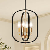 AKLMXCG black and gold chandelier over dining table with warm ambient light