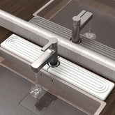 AKUVU faucet mat with absorbent diatomite soaking up water quickly around the faucet.