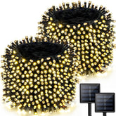Albelt 2-pack 170ft solar string lights outdoor illuminate a garden path.