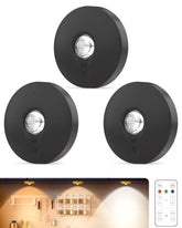 Aokpsrt rechargeable puck light with remote, left view for cabinet lighting.