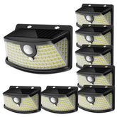 Aootek solar motion light at the front door enhances entry visibility.