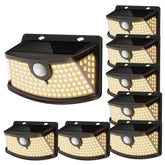 Aootek solar motion light at the front door with motion-activated glow