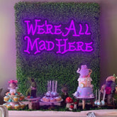 AOOWSDX Alice Wonderland neon sign 16x8 illuminates walls with whimsical charm.