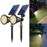 APOMAO solar spot lights with adjustable panels illuminate driveways with targeted warmth.