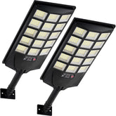 Aqraou solar lights outdoor 6500K dusk-to-dawn illuminating garden paths safely.