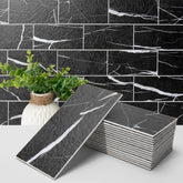 Art3d black marble texture peel-stick backsplash tile with realistic veining for kitchen upgrade