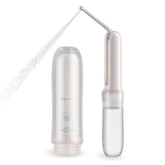 Artist Unknown portable electric bidet sprayer handheld in use for personal cleaning on the go.