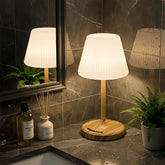 AUDLES cordless table lamp in wood grain adds warm ambience to any room.
