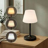 AUDLES cordless table lamp on a dining table offering warm, adjustable light for reading.