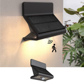 AURAXY motion sensor outdoor light with optical lens illuminating the front door area safely.