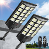 Azeivk solar lights outdoor pack 2 front view showing yard lighting and security glow
