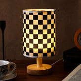 Baquler checkered bedside lamp with wood base adds playful lighting for bedtime reading