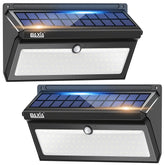 BAXIA Technology solar wall light mounted at the front door for bright evening lighting.