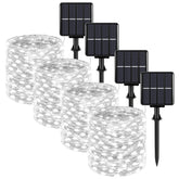 BesLowe solar fairy lights with silver wire illuminate decks and gardens for a soft glow.