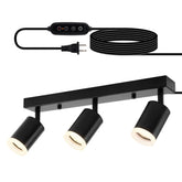 Bojim ceiling track lighting with three black heads for a modern living room ambiance.