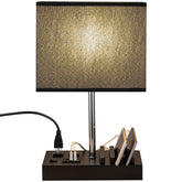 Briever USB Table Lamp with three USB ports at bedside.