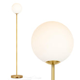 Brightech Luna floor lamp with brass frosted globe for elegant living room lighting.