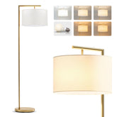 Brightech Montage Modern Floor Lamp with arc arm lighting a cozy living room