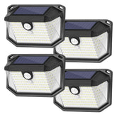 Brightever 4-pack solar wall lights front view illuminating entry path