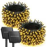 Brightown 2-pack solar string lights illuminate outdoor garden with a warm white glow.