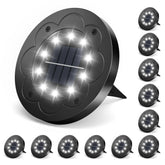 Brightown solar light ground stake illuminating a pathway with energy-efficient glow.