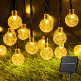 Brightown solar string lights 60 LED 36ft with a warm glow for outdoor spaces