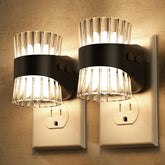 Briignite Night Light plugged into wall outlet with soft ambient glow.