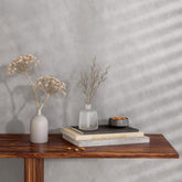 Bumoo gray-silver limewash wallpaper roll demonstrating easy, removable decor