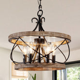 Chords Attic farmhouse wood chandelier with drum silhouette above dining table for cozy ambience