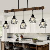 CmnVmn 5-light kitchen chandelier over island with wood and black metal finish for modern kitchens