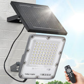 CNOIJUTS 100W solar flood light outdoors provides bright parking lot illumination