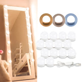 Consciot LED vanity lights surround the mirror for even makeup lighting.