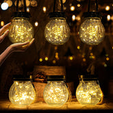 Cooo crackle-glass lantern closeup shows durable build and secure hanging rope