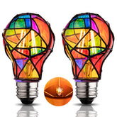 CybaaLuxzus stained glass bulb with rainbow paint lights a tabletop scene