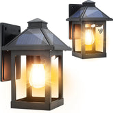 CYHKEE solar wall lanterns mounted on wall illuminate entryways with dusk-to-dawn efficiency.
