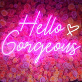 DAKABUKA Hello Gorgeous pink neon sign backdrop enhances party ambiance and photo ops.