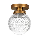 Daunton small semi-flush globe clear glass shade for warm entryway lighting.