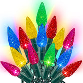 Dazzle Bright C6 string lights on a Christmas tree for indoor festive glow