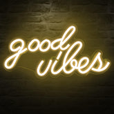 DECANIT Good Vibes neon sign with warm white glow for stylish wall decor.