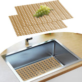 Decostatue 2-pack sink protector mat laid in sink protecting delicate dishes.