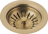 Delta 72010-CZ flange and strainer in champagne bronze for durable kitchen sink setup.