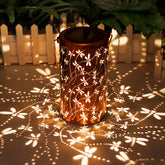 DIBIEECN dragonfly lantern hanging outdoors with warm garden glow.