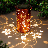 DIBIEECN solar lantern hummingbird-pattern illuminates garden nights with warm, decorative light.