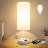 Dicoool white touch bedside lamp on a dresser with soft reading glow