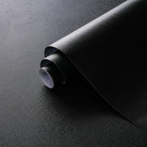 Dimoon black embossed peel-and-stick wallpaper close-up showing texture