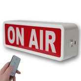 DMKYDM ON AIR sign front view in studio with clear broadcast status cue